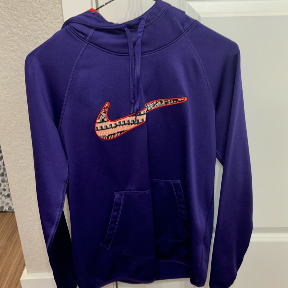 Small purple Nike sweatshirt